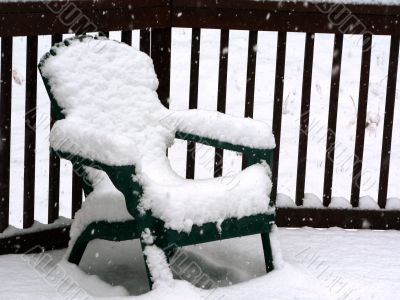 snow on patio chair