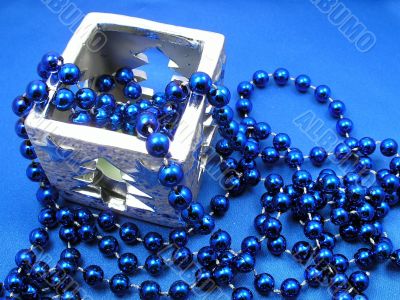  Silver candlestick and blue beads