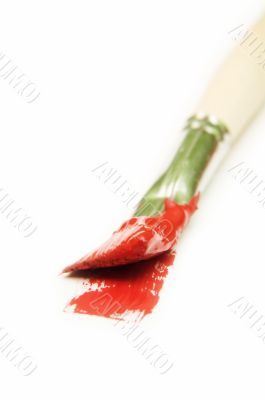 brush and red paint