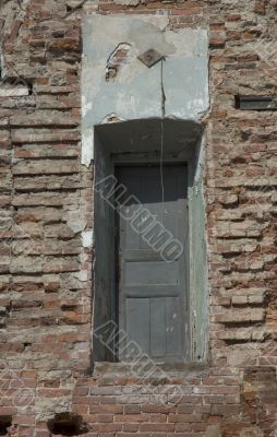 door of destroyed house