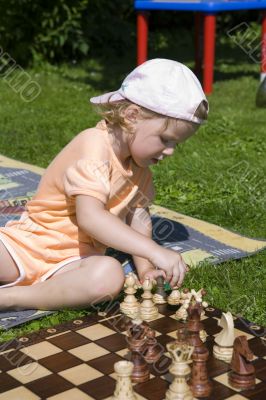 Girl playing chess