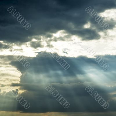 stormy cloud with sun rays
