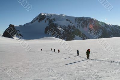 group of mountaineers on a glacier