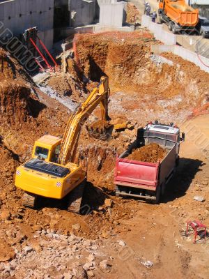 Bulldozer and dump truck