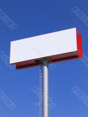 Blank billboard over blue sky