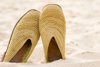 sandals on a beach