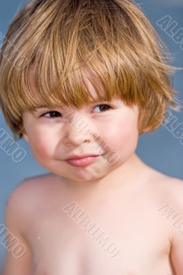 young boy in summer sunlight