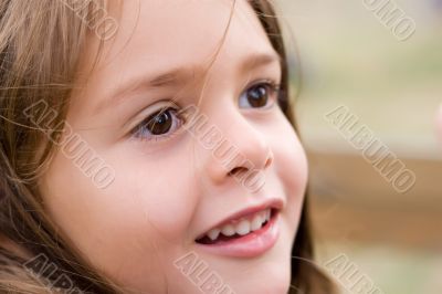 little girl dreaming