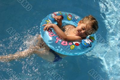 Girl in a swimming-pool