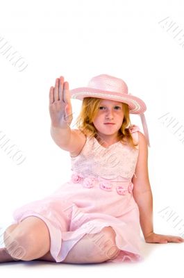 girl making a stop sign