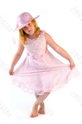 girl standing in pink dress