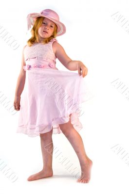 girl standing in pink dress