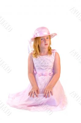 girl sitting in pink dress