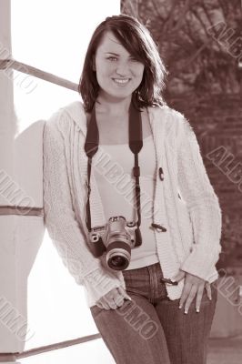 Girl with SLR photo camera