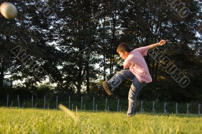 boy plays soccer
