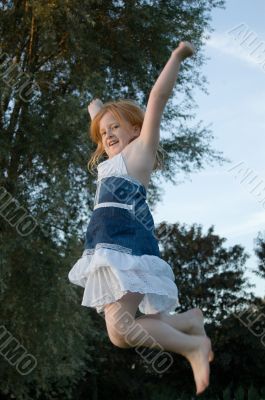 girl jumping and cheering