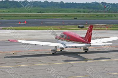 Red and White Plane Parking