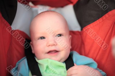 Baby sitting in stroller. Close-up #3