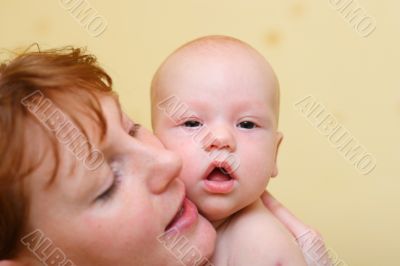 Mother gently holding baby in hands #2