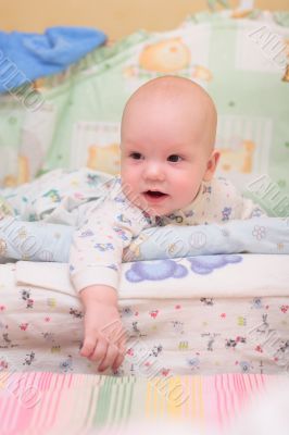 Baby rest on bed and look at camera #5