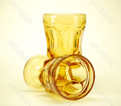 yellow stemmed drinking glasses