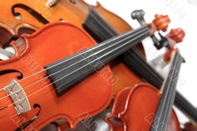 Three violins. Soft focus