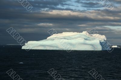 Iceberg with surrealistic blue swirls,