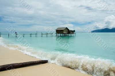 stilt house in tropical waters
