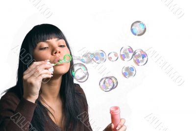 The girl and soap bubbles