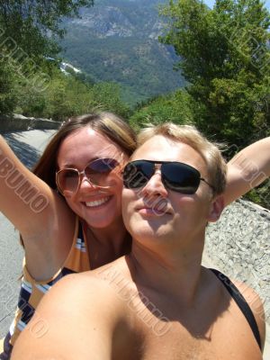 Portrait of young pair in sunglasses