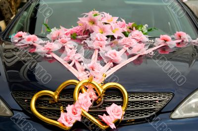 The decorated wedding car.