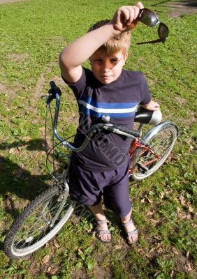 Boy with bicycle