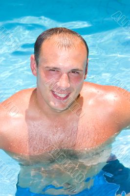 young man in the swimmingpool