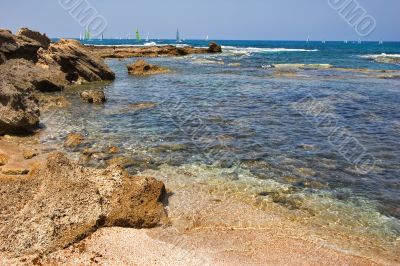 Sailing vessels in the sea.