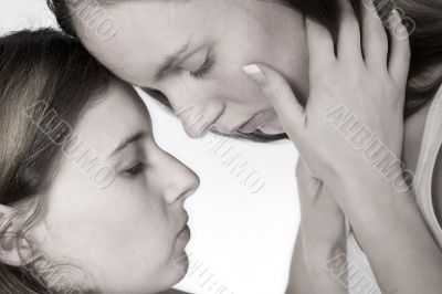 Holding her face