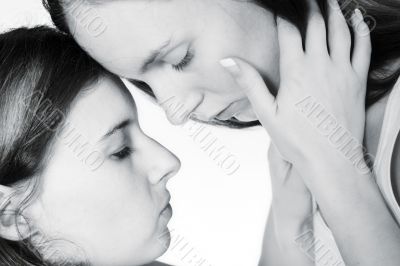 Holding her face