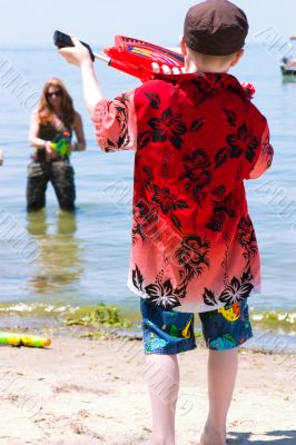Mother and Son playing at the beach