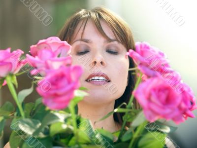Happy woman with roses