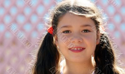 A little girl smiling