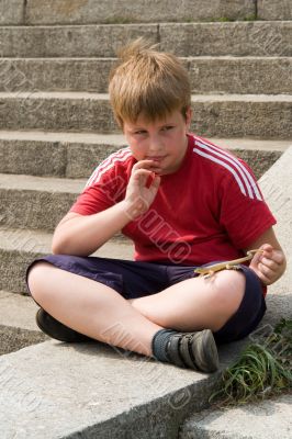 boy with the toy lizard