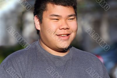 Asian teenager outdoors