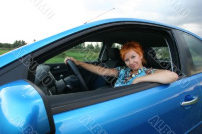 Young woman in a car