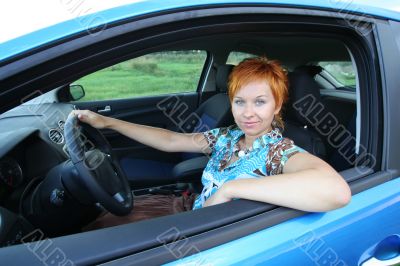 Young woman in a car