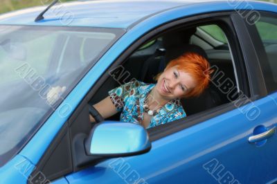 Young woman in a car