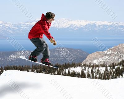 Snowboarder jumping
