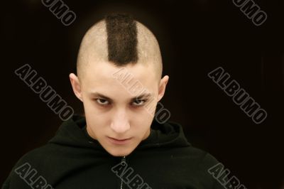 Teenager with mohawk