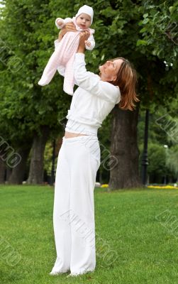 happy mother with adorable baby