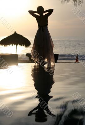 Woman watching sunset