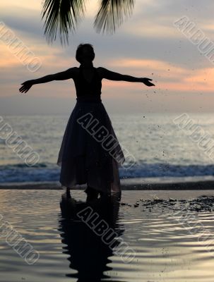 Woman watching sunset