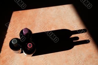 Wine Bottles with Dramatic Shadow